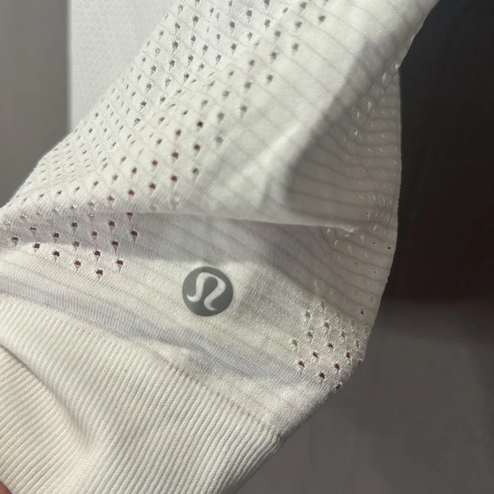 Lululemon Athletica White Sleeveless Crop Muscle Tee